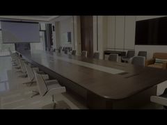 Einziehbarer Monitor, integriert in ein Konferenzsystem